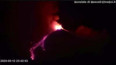 Mount Etna, Sicily, Italy - 12 May 2025 - Eruption sent ash above the summit