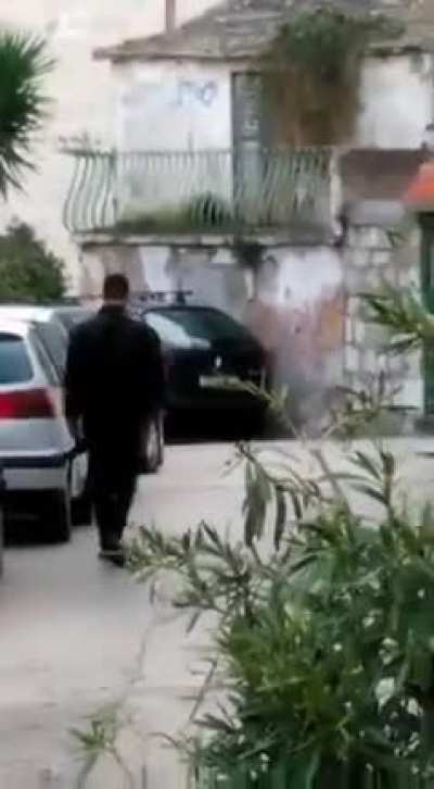 Filip Zavadlav walking away after gunning down 3 drug dealers who allegedly threatened his brother. (Split, Croatia, 2020)