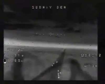 A group of Ukrainian soldiers is targeted by an FPV drone at night