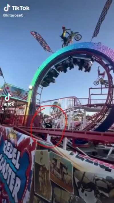 Grabbing your dropped phone from the rollercoaster track