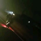 Doing stunts on a busy dark road
