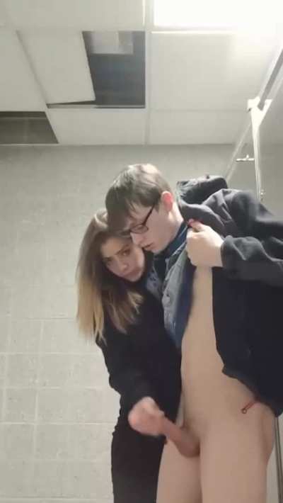 Cheerleader helping out the nerd