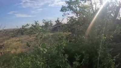 Headcam footage from a Ukrainian soldier fighting at a settlement on the Bakhmut front, also close encounter with a Russian drone at 1:51