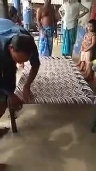 A guy makes a bed in two minutes