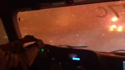 Apocalyptic scenes: fire crew driving through the Tamarack Fire