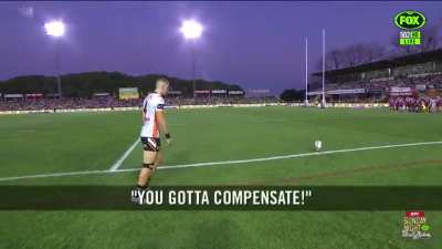 Fan has some fun with Adam Doueihi as he is kicking for goal