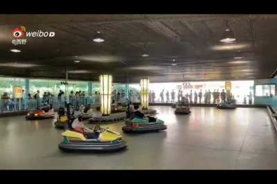 Japanese people in bumper cars