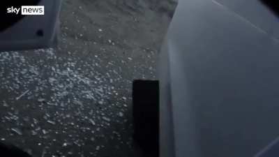 Journalist takes 2 rounds into their body armour at a checkpoint