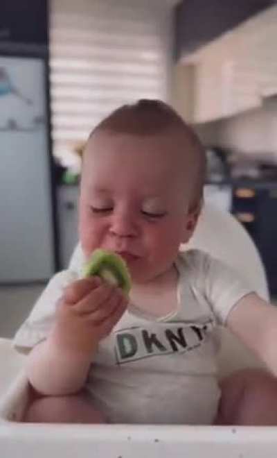 This little lad enjoying his first kiwi
