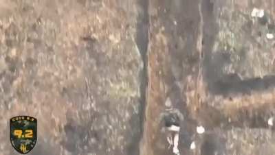 Russian soldier without pants gets interrupted by UA drone. Unknown time/place.
