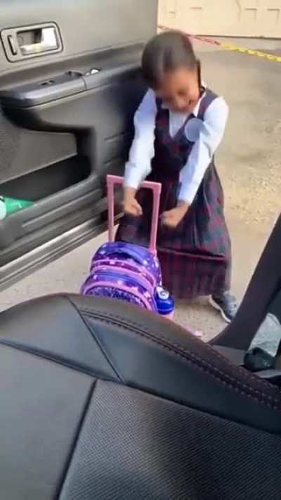 Girl excited to be back to school.