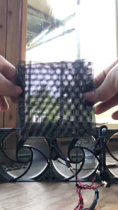 [OC] Hexagon Pattern Emerges When Two Mesh Filters Are Turned