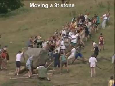 People pulling a 9t stone