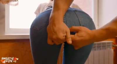 Ripping her cloth..