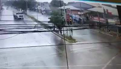 Truck going at high speeds on a slippery highway almost kills pedestrians.