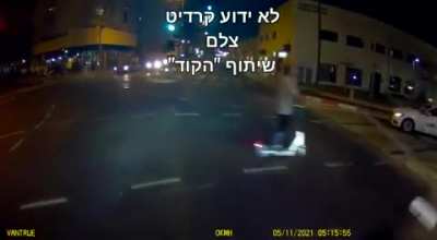 WCGW driving a scooter on red light.