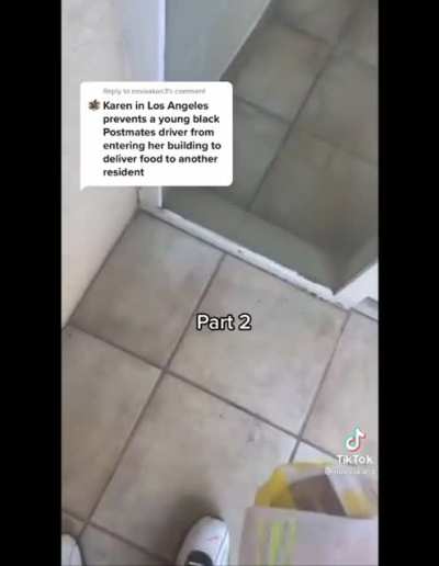Decrepit Karen in Los Angeles prevents a young black Postmates driver from entering her building to deliver food to another resident. Demands he stops filming her.