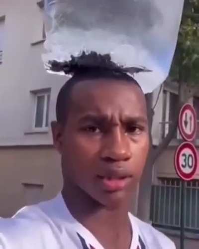 Is that a fish in ice on his head, I’m honestly so confused.