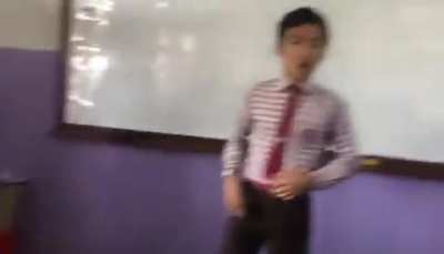 Haarami last benchers after taking phone in class
