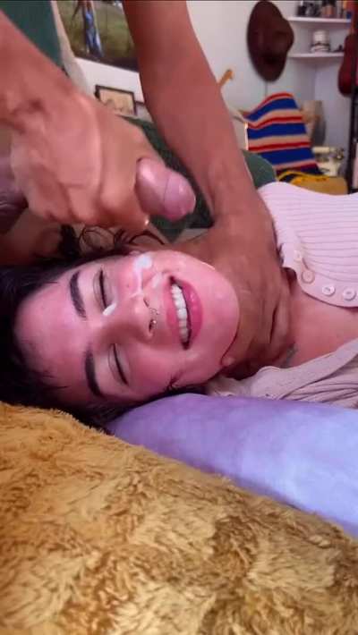 Love the way she maintains eye contact while he uses her face to cum