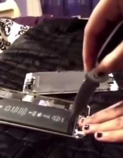 Kid tries cutting a battery