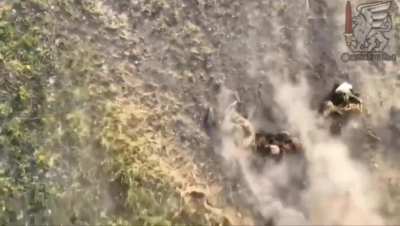 Accurate drone dropped grenade strike lands directly on a Russian soldiers head.