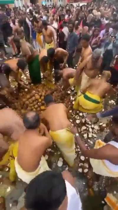 Coconut bashing by indians on the streets of Paris , France