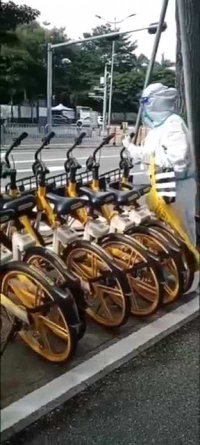 Chinese authorities testing bikes for COVID in Zhengzhou China