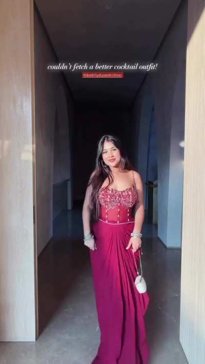 Muskan Ranka in magenta-colored Indo-western pre-draped saree gown featuring an embellished corset-style bodice