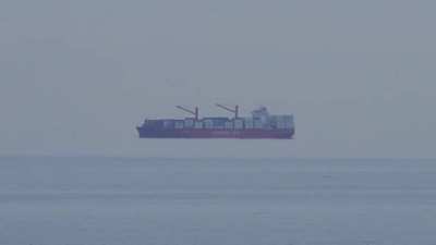 Fata Morgana (aka Flying Dutchman) is an optical illusion that occurs because of the weather condition known as a 'temperature inversion'. It bends light between the object in the distance and the viewer, making a mirage appear