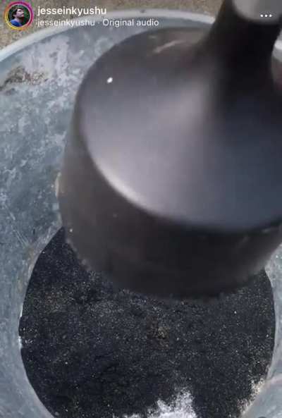 Collecting magnetite on the beach