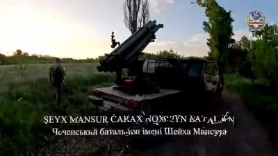 Soldier's of Sheikh-Mansour Battalion firing 122mm Grad rockets from a technical rocket launcher against Russian positions in the Kharkiv Oblast. June 2024