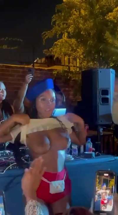Janelle Monae flashing at a concert