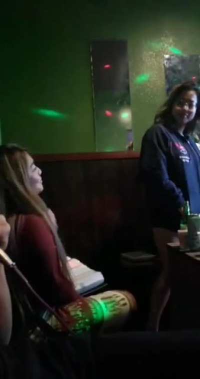 My bff acting out the karaoke lyrics on me