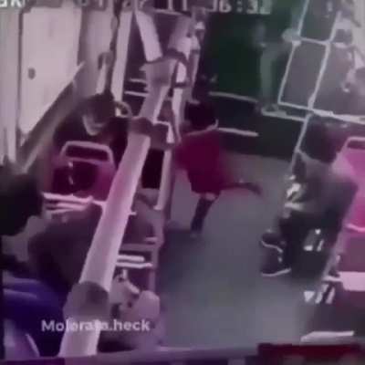 Man kicks kid in train