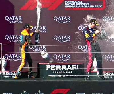 Lando destroying Max's first place Hungarian trophy.