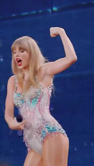 Taylor Flexing her Muscles.