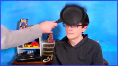 Scott gets hit by a frying pan