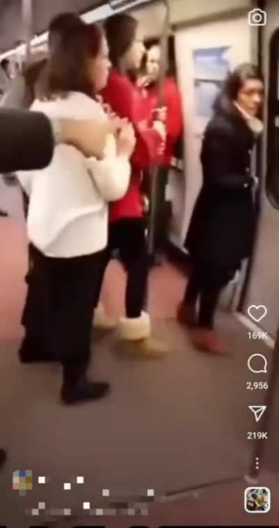 I think he wants to tell the conductor that he has a problem
