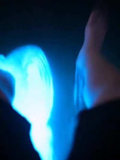Dragging feet though bioluminescent water