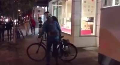 Karen decides to play traffic warden and blocks him from leaving after witnessing him jaywalking.