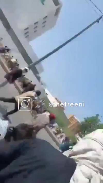 US marines shooting at protestors who were trying to breach the US embassy in Karachi