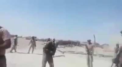 Pakistani paramilitary soldiers kill a suspected Taliban suicide bomber. [Not for the faint hearted]