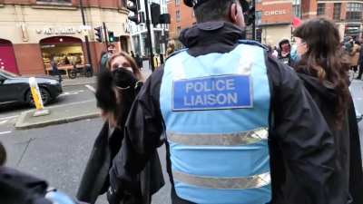 Guy doesn't like protestors, protestors doesn't like guy, arguments and scuffle ensues