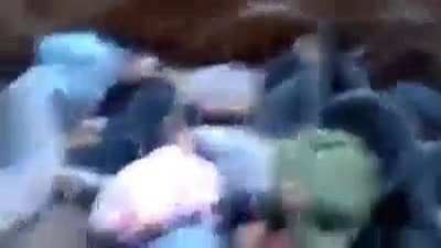 Newly released war crimes footage shows SAA and pro Assad regime militias executing dozens of civilians in Damascus in 2013. Very NSFW!