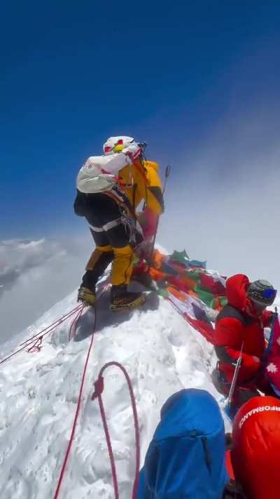 A Sherpa does push-ups at the summit of Mt. Everest without supplementary oxygen - Lakpa Sherpa shows Sherpa power on top of the World.