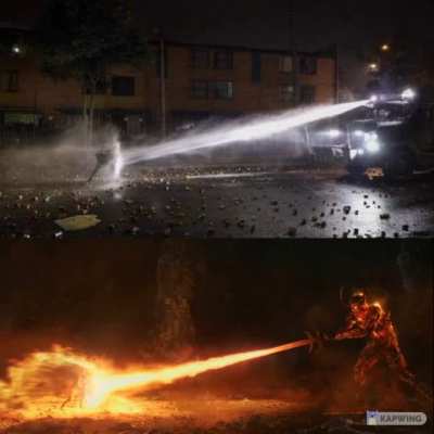 A Colombian protestor managed to hold back a water cannon using a homemade shield