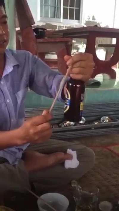 Opening a beer bottle with a shish kabob skewer...