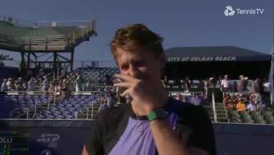 Sebastian Korda being interviewed after beating Flavio Cobolli