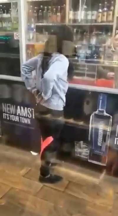 Woman pisses all over floor